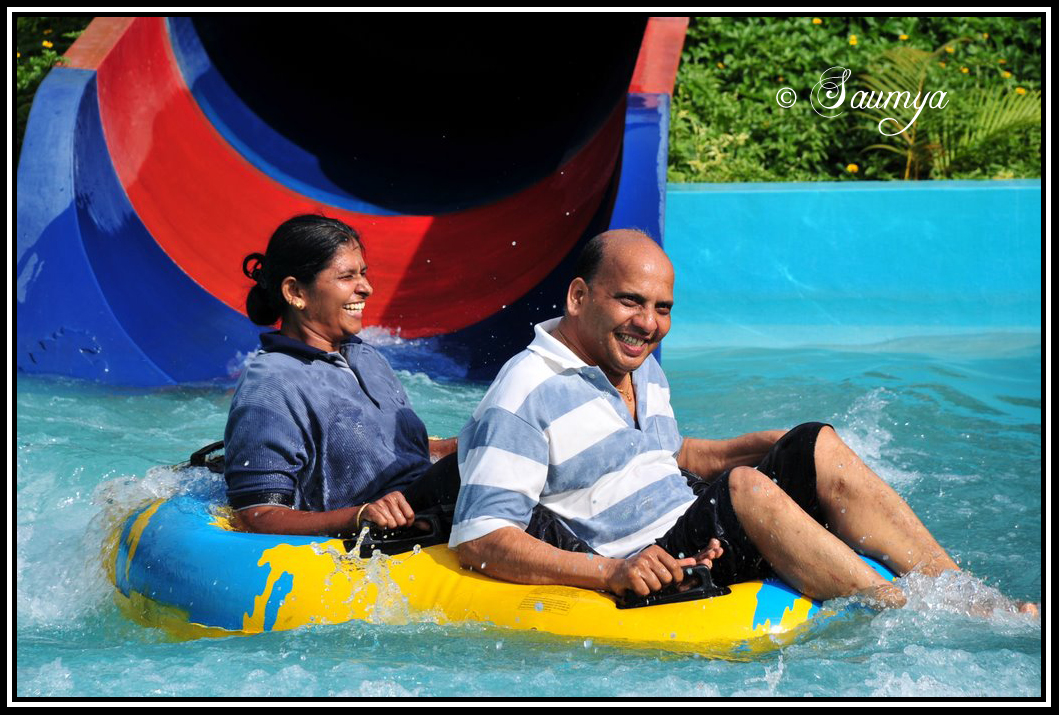 pictures of people having fun. People having fun on the water rides at Wonder-la Bangalore